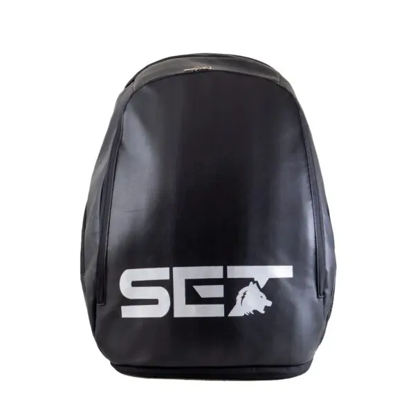 Woman wearing yellow tennis shoes and holding a tennis racket